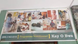 Christmas Party from Kay-O-Bois malnutrition program - Sign