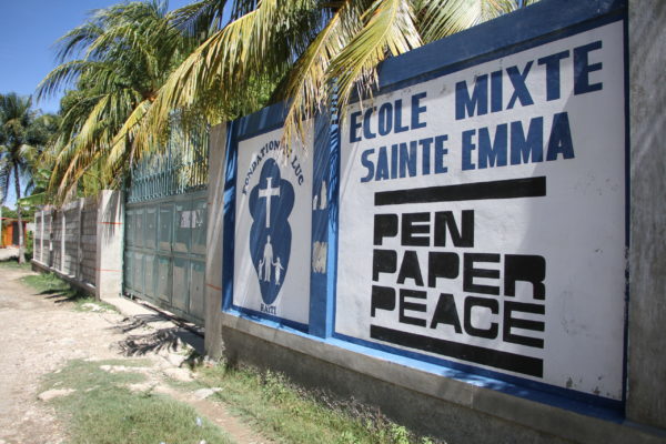 The sign for Ecole Mixte Sainte Emma Pen Paper Peace
