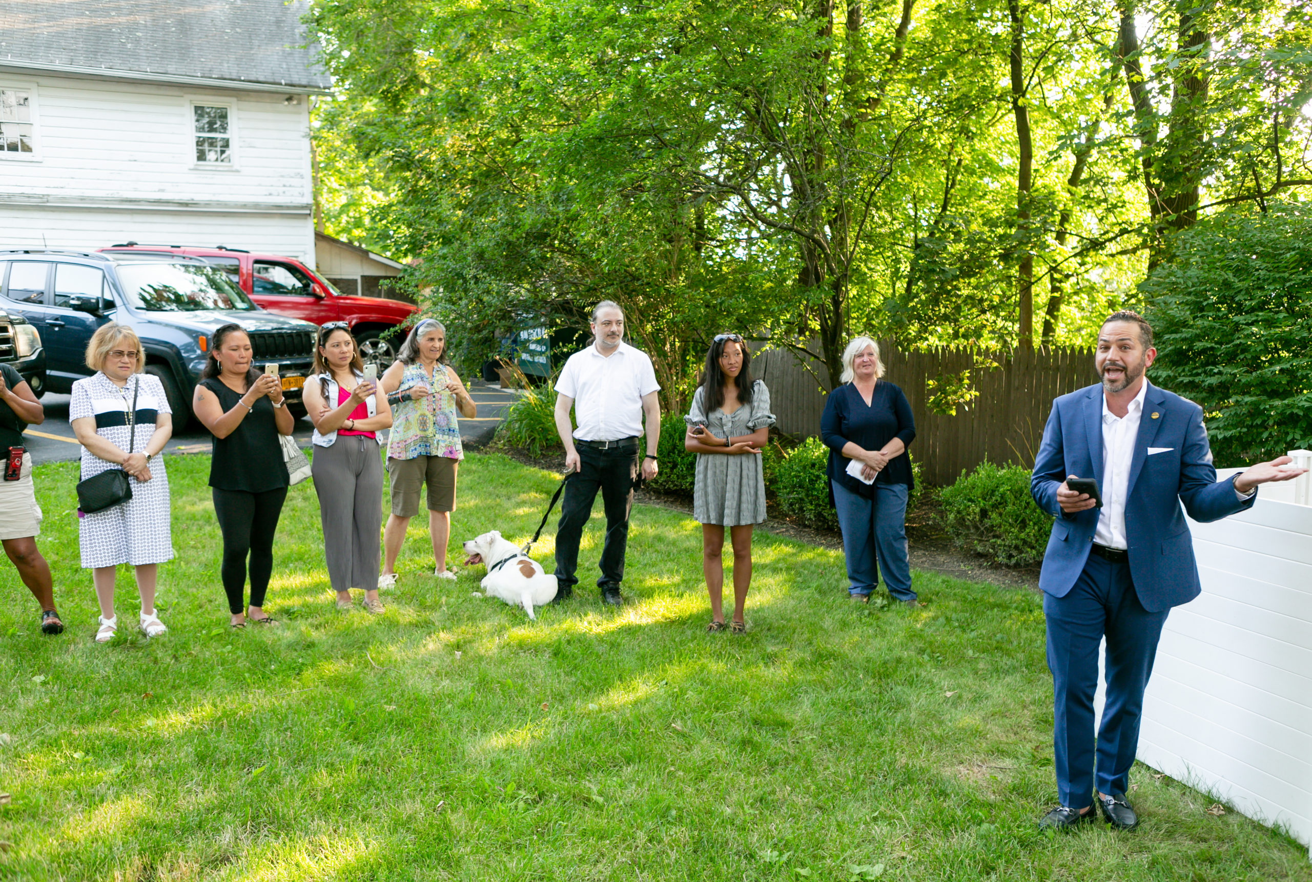 Networking at a Ribbon Cutting for a Business Colleague