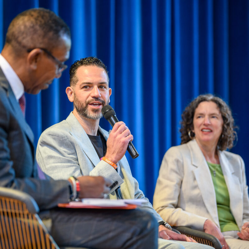 Michael Esposito speaking with SUNY New Paltz President at Inauguration Regional Impact Panel