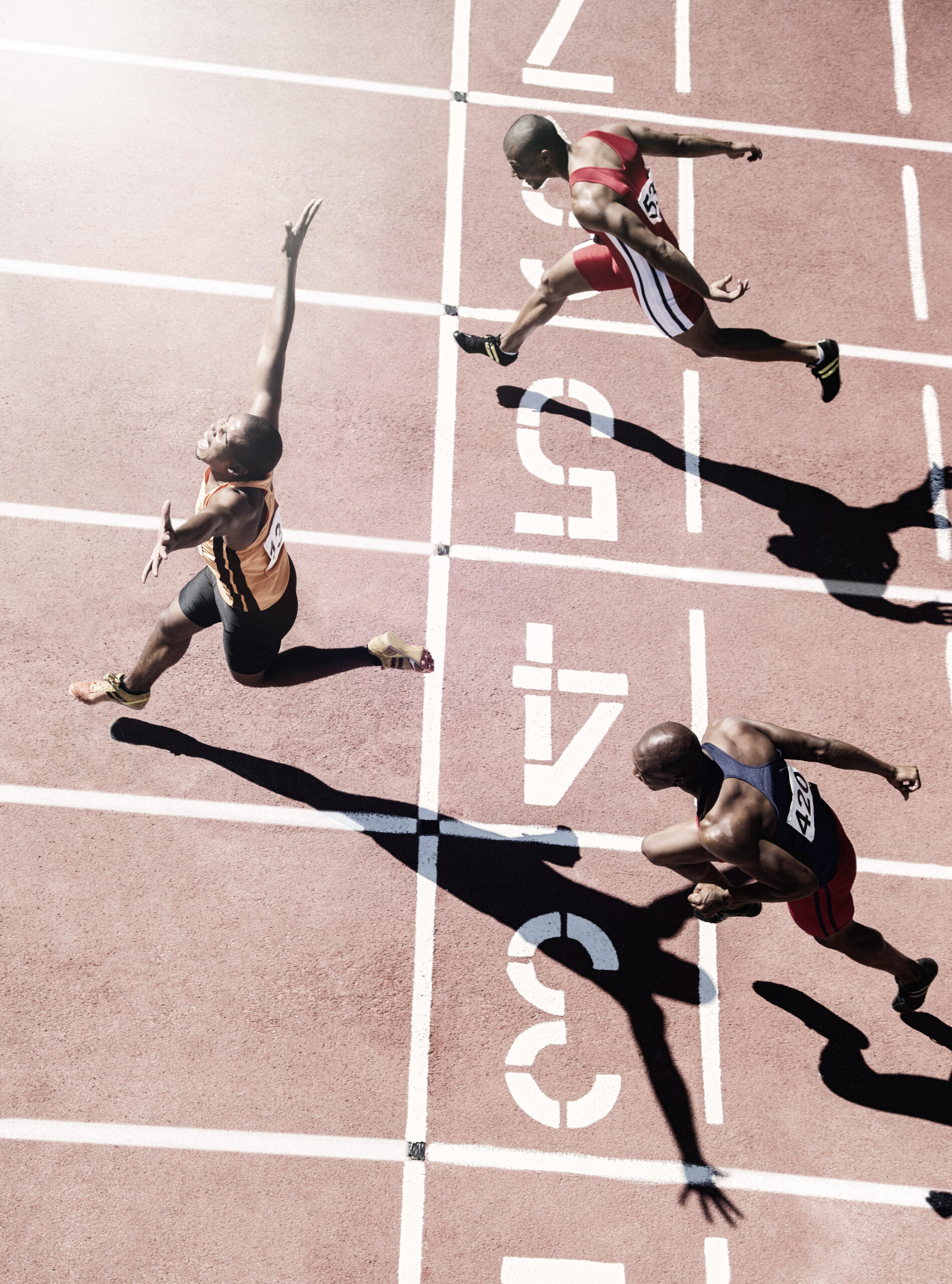 Runners crossing finish line